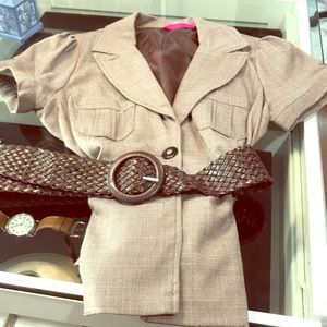 Brown blouse with matching belt.
